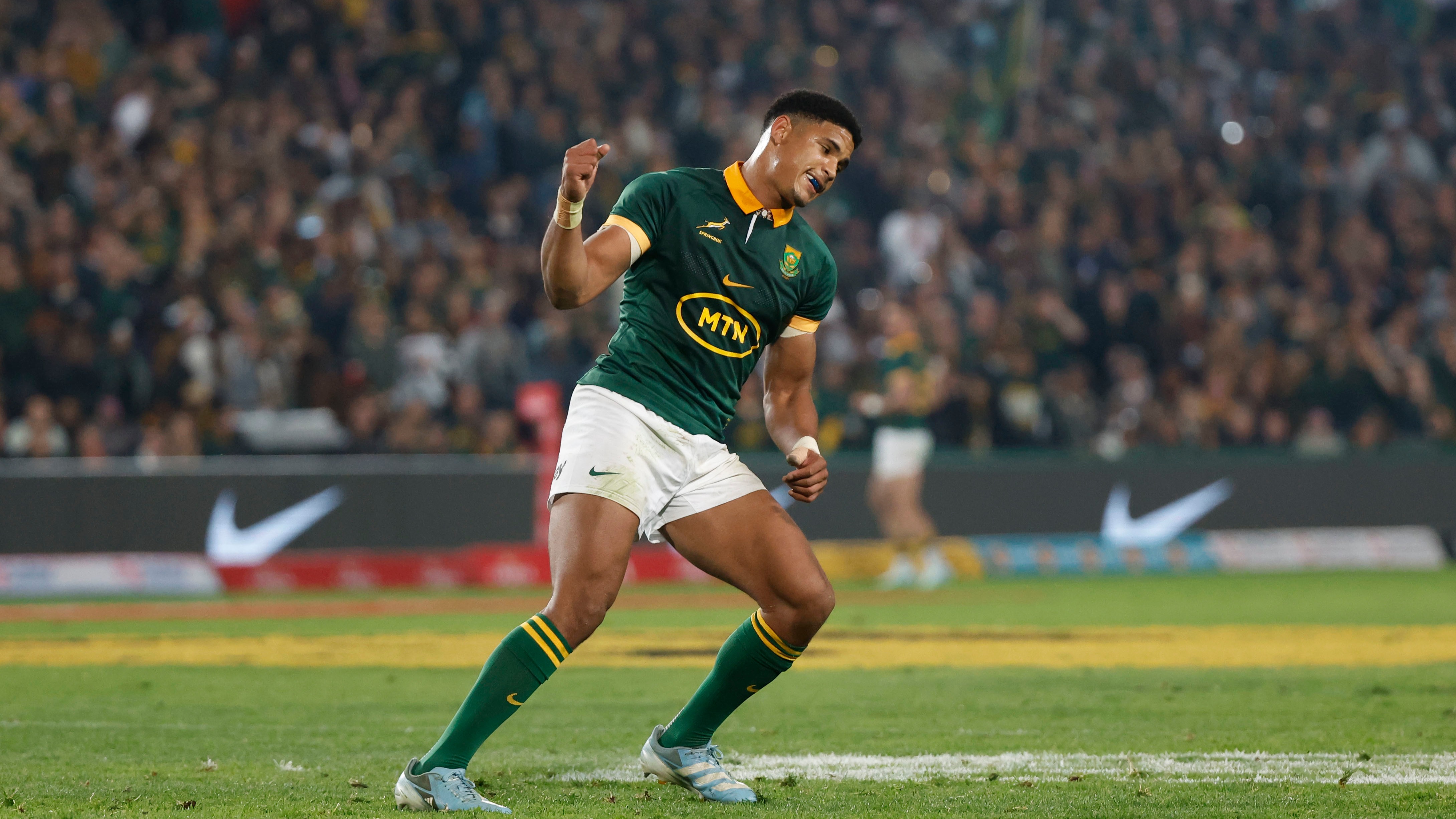 Sacha Feinberg-Mngomezulu celebrates after kicking a conversion.