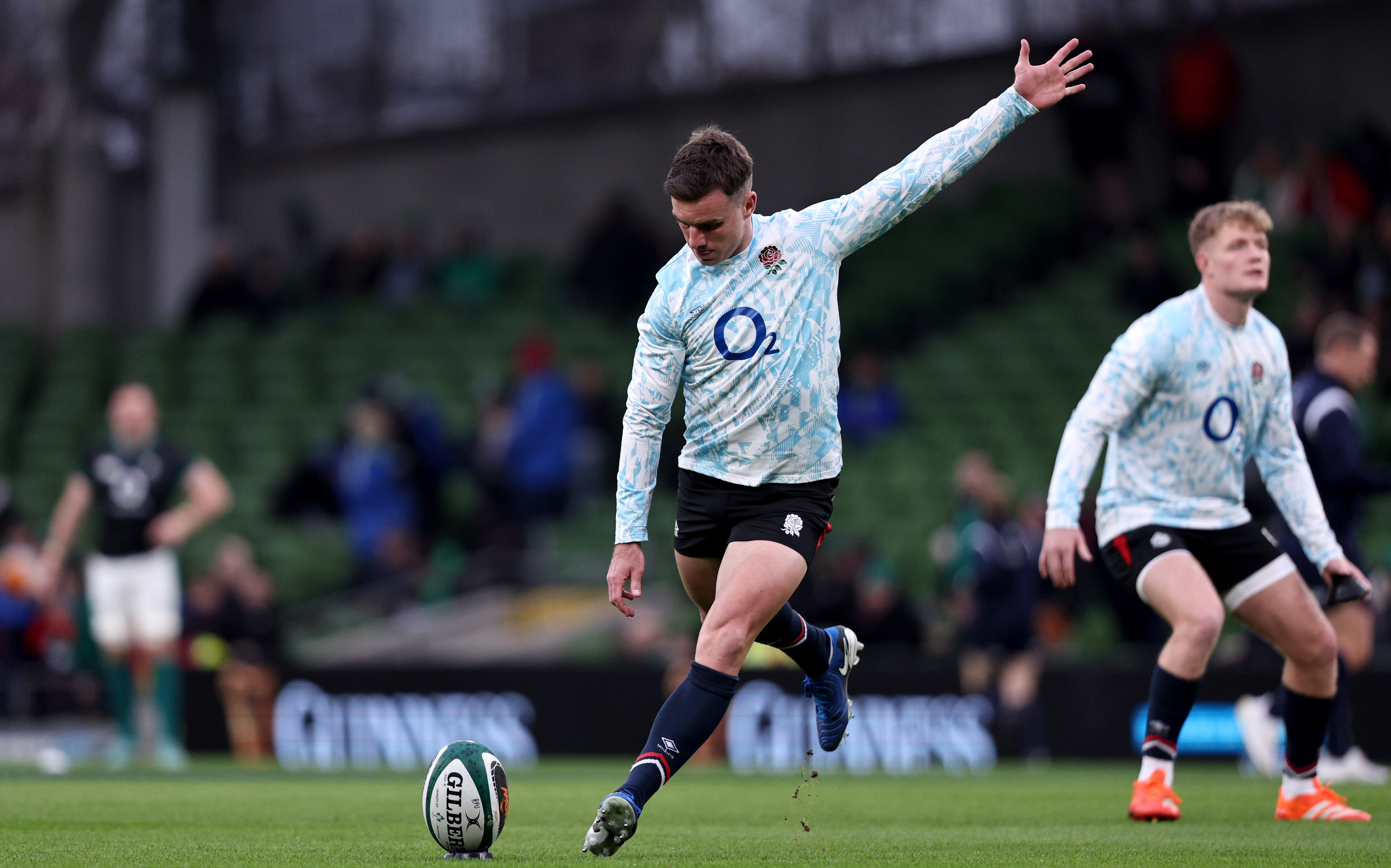 England's George Ford kicks a ball in warm-up for the 2025 Guinness Six Nations match against Ireland.