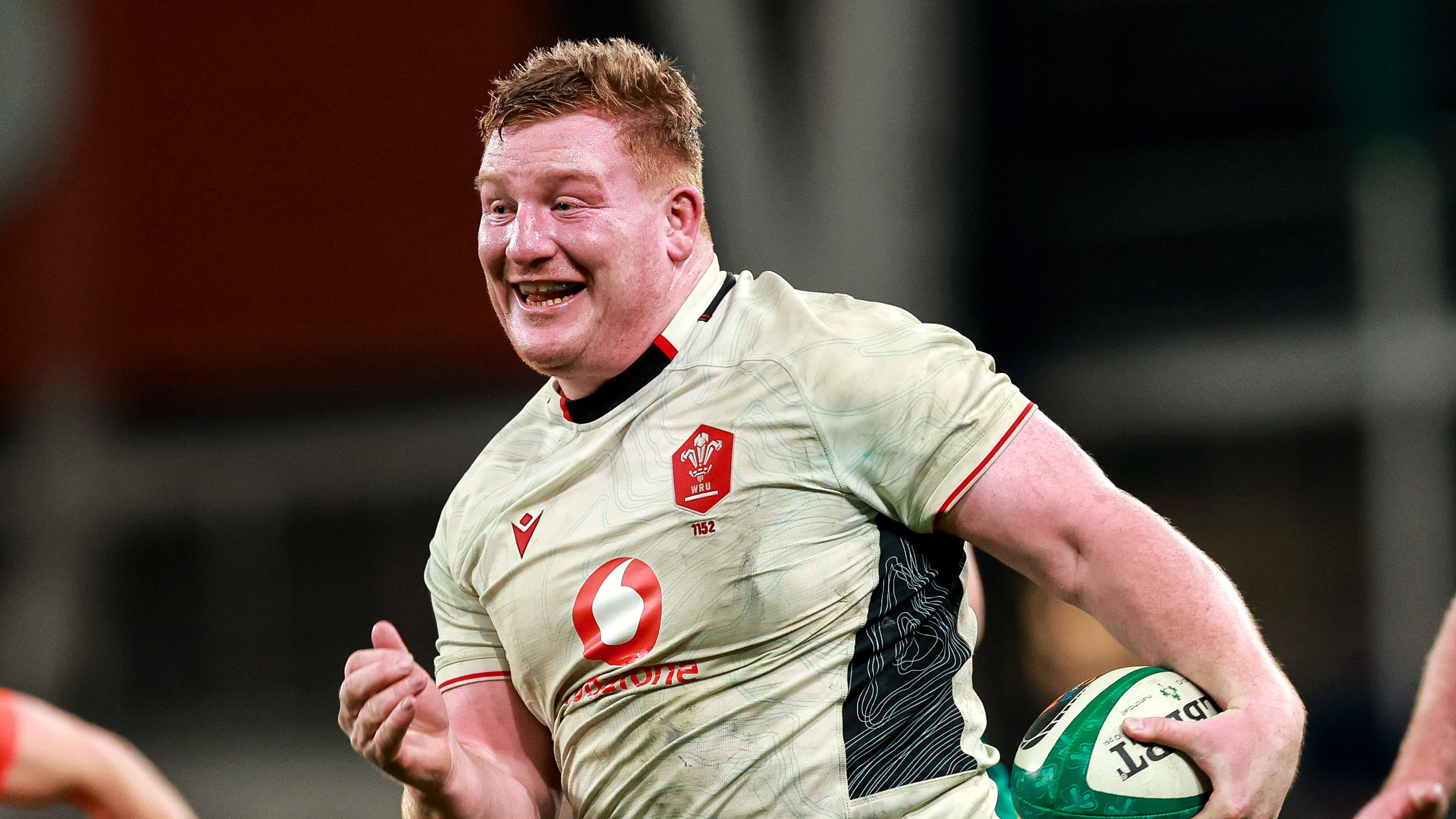 Rhys Carre smiles as he charges in for a famous prop's try against Ireland in round four of the 2026 Championship.