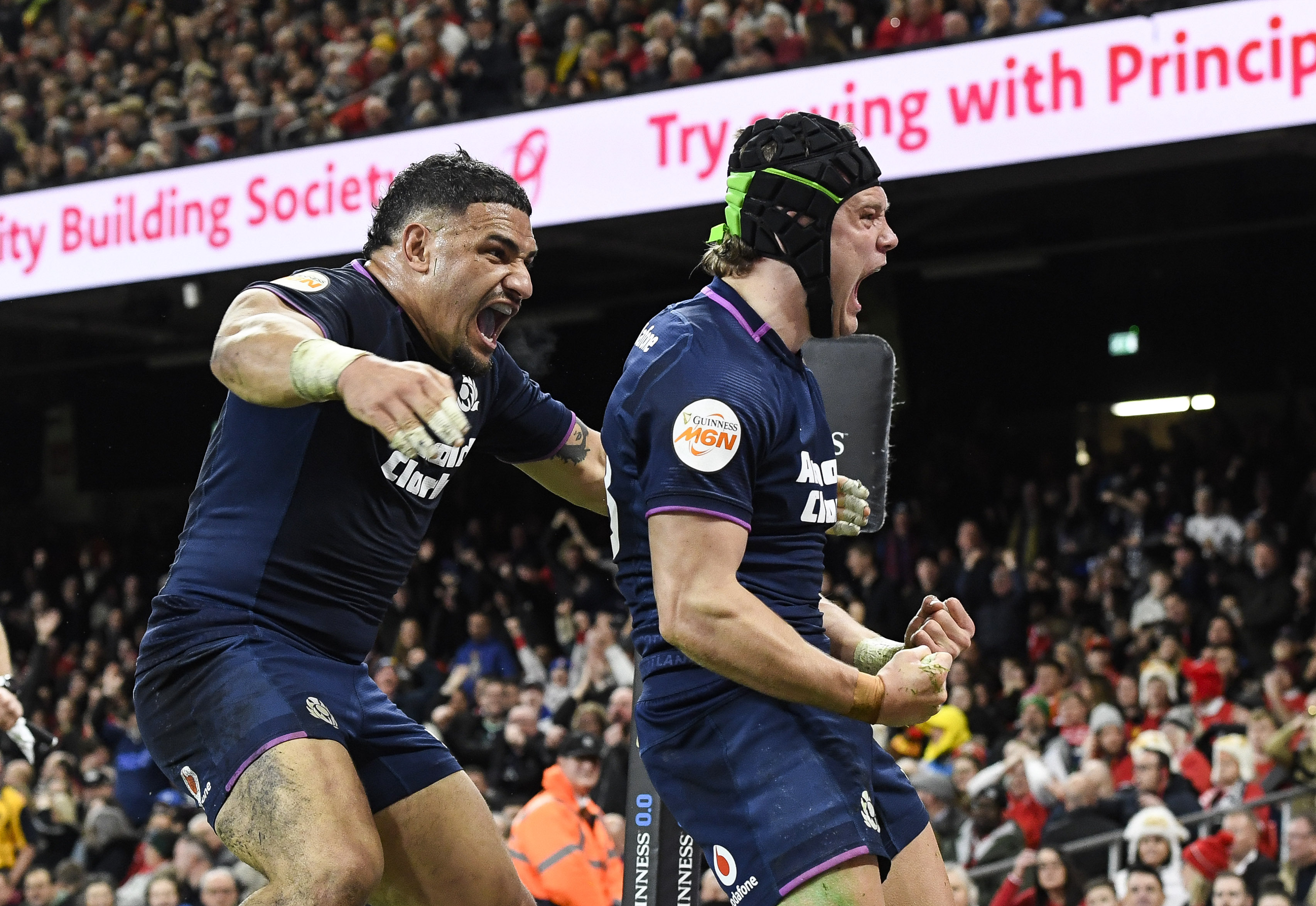 Scotland's Darcy Graham celebrates with Sione Tuipulotu after he scores his sides 3rd try of the match during the 2026 Guinness Six Nations Championship Round 3 game between Wales and Scotland in the Principality Stadium, Cardiff, Wales, Saturday, February 21, 2026 (Photo by Andrew Dowling / Inpho)