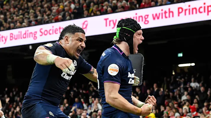 Scotland's Darcy Graham celebrates with Sione Tuipulotu after he scores his sides 3rd try of the match during the 2026 Guinness Six Nations Championship Round 3 game between Wales and Scotland in the Principality Stadium, Cardiff, Wales, Saturday, February 21, 2026 (Photo by Andrew Dowling / Inpho)
