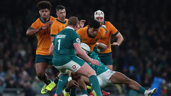 Australia's Joseph-Aukuso Sua'ali'i is tackled during the 2025 Quilter Nations Series game between Ireland and Australia in Aviva Stadium, Dublin.
