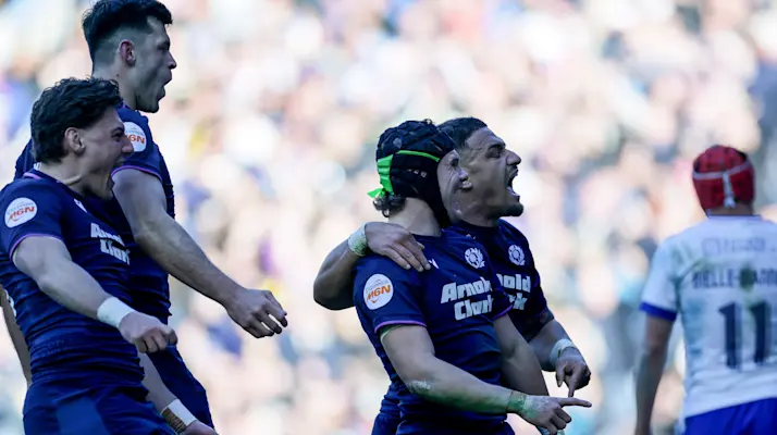Darcy Graham celebrates scoring a try with teammates in the Scotland v France match in Edinburgh, 2026.