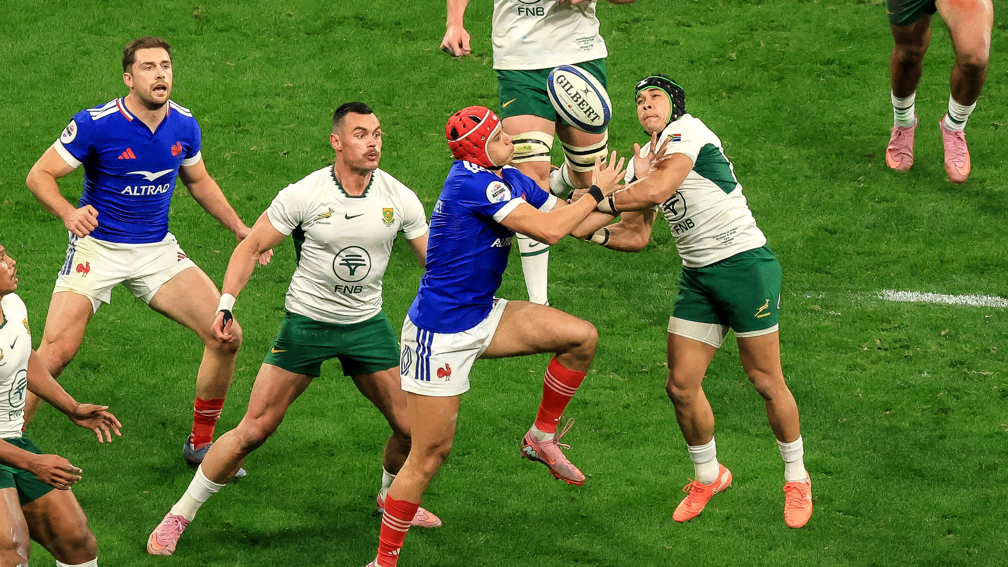 Louis Bielle-Biarrey and Cheslin Kolbe compete for a high ball during the France v South Africa match in 2025.