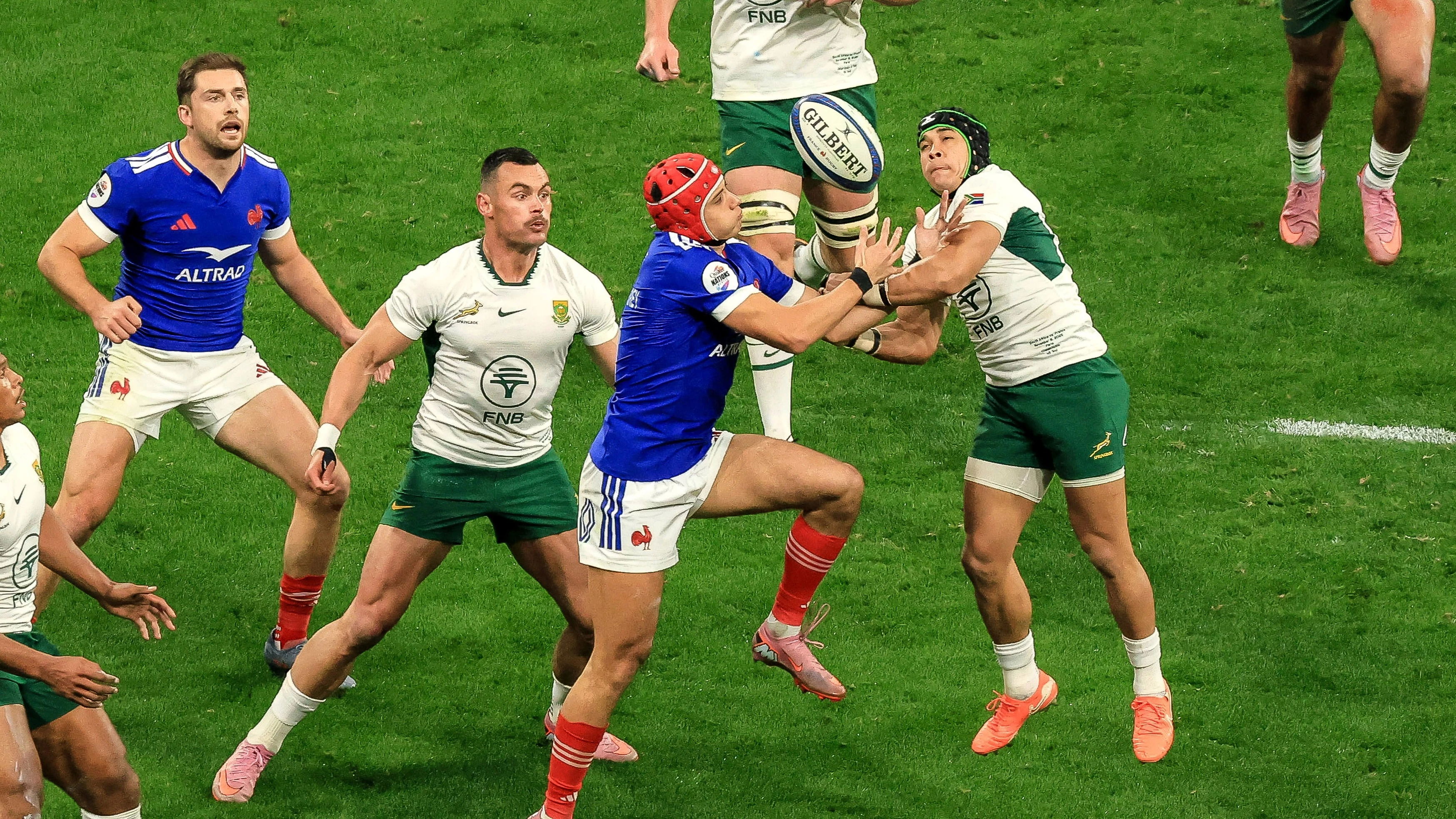 Louis Bielle-Biarrey and Cheslin Kolbe compete for a high ball during the France v South Africa match in 2025.