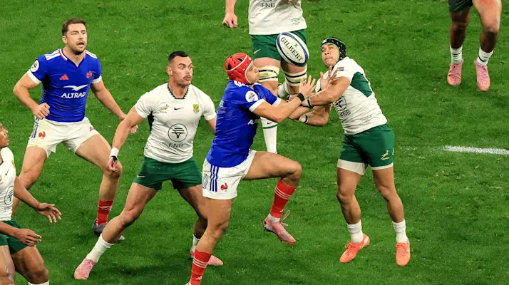Louis Bielle-Biarrey and Cheslin Kolbe compete for a high ball during the France v South Africa match in 2025.
