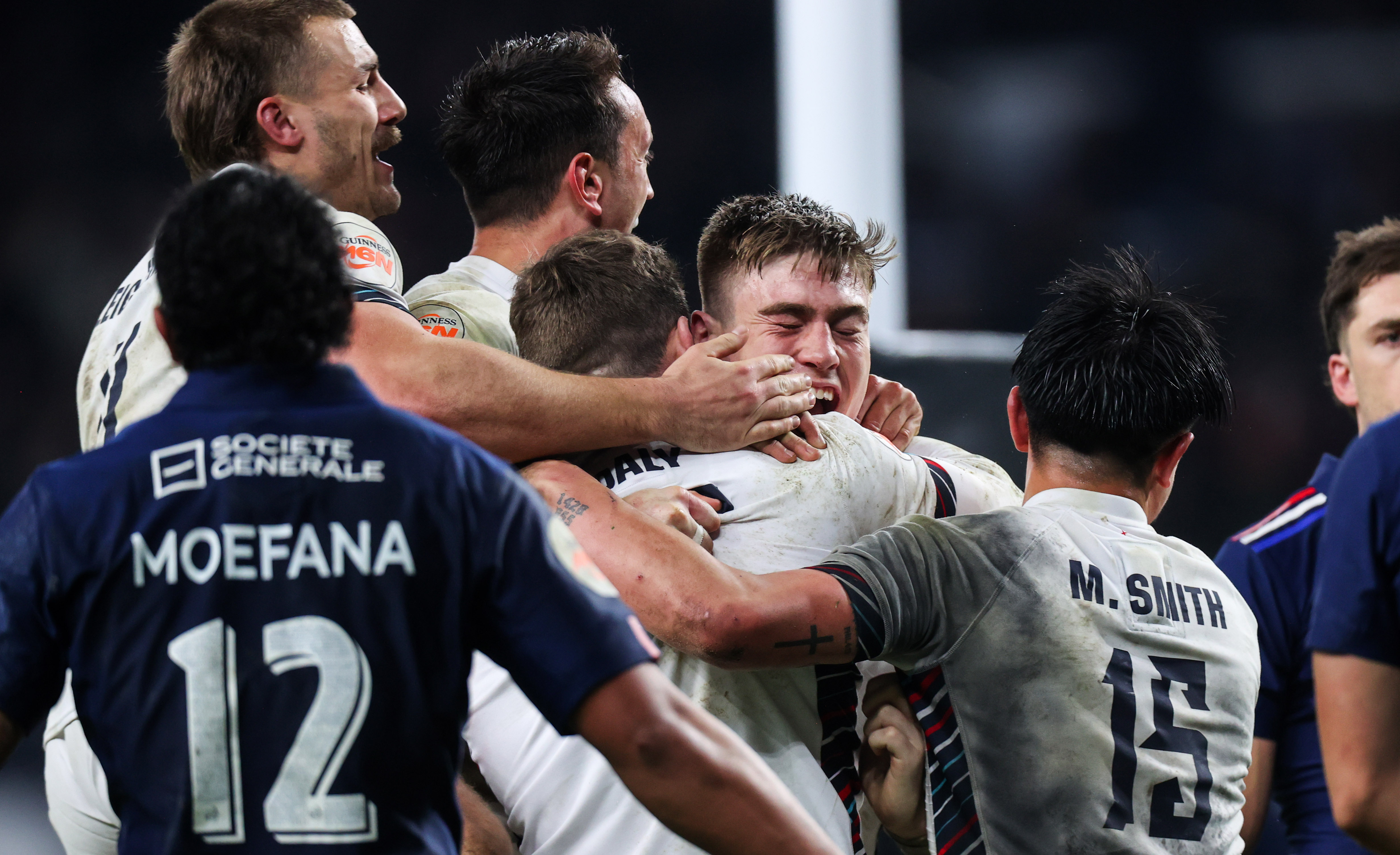 England’s Elliot Daly is mobbed by teammates after scoring the winning try during the 2025 Guinness Six Nations Championship Round 2 between England and France in Twickenham Stadium, London