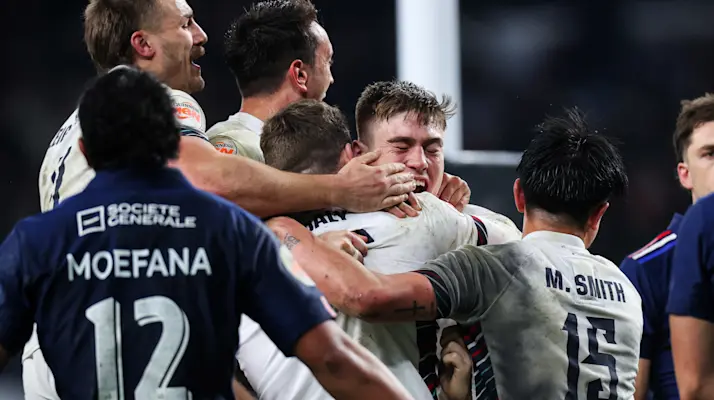 England’s Elliot Daly is mobbed by teammates after scoring the winning try during the 2025 Guinness Six Nations Championship Round 2 between England and France in Twickenham Stadium, London