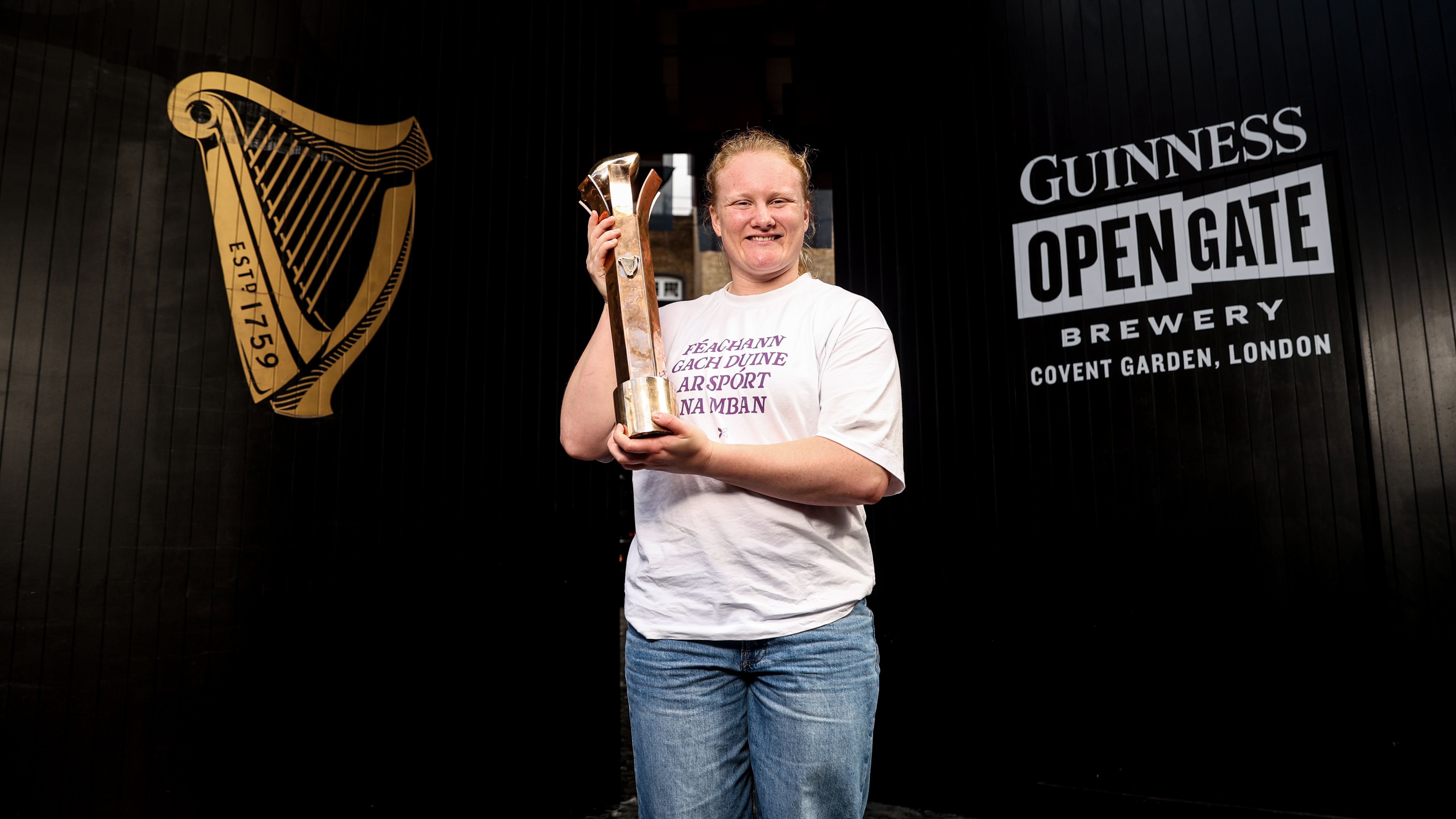 Aoife Wafer holding the 2026 Guinness Player of the Championship award at the Guinness Open Gate Brewery.