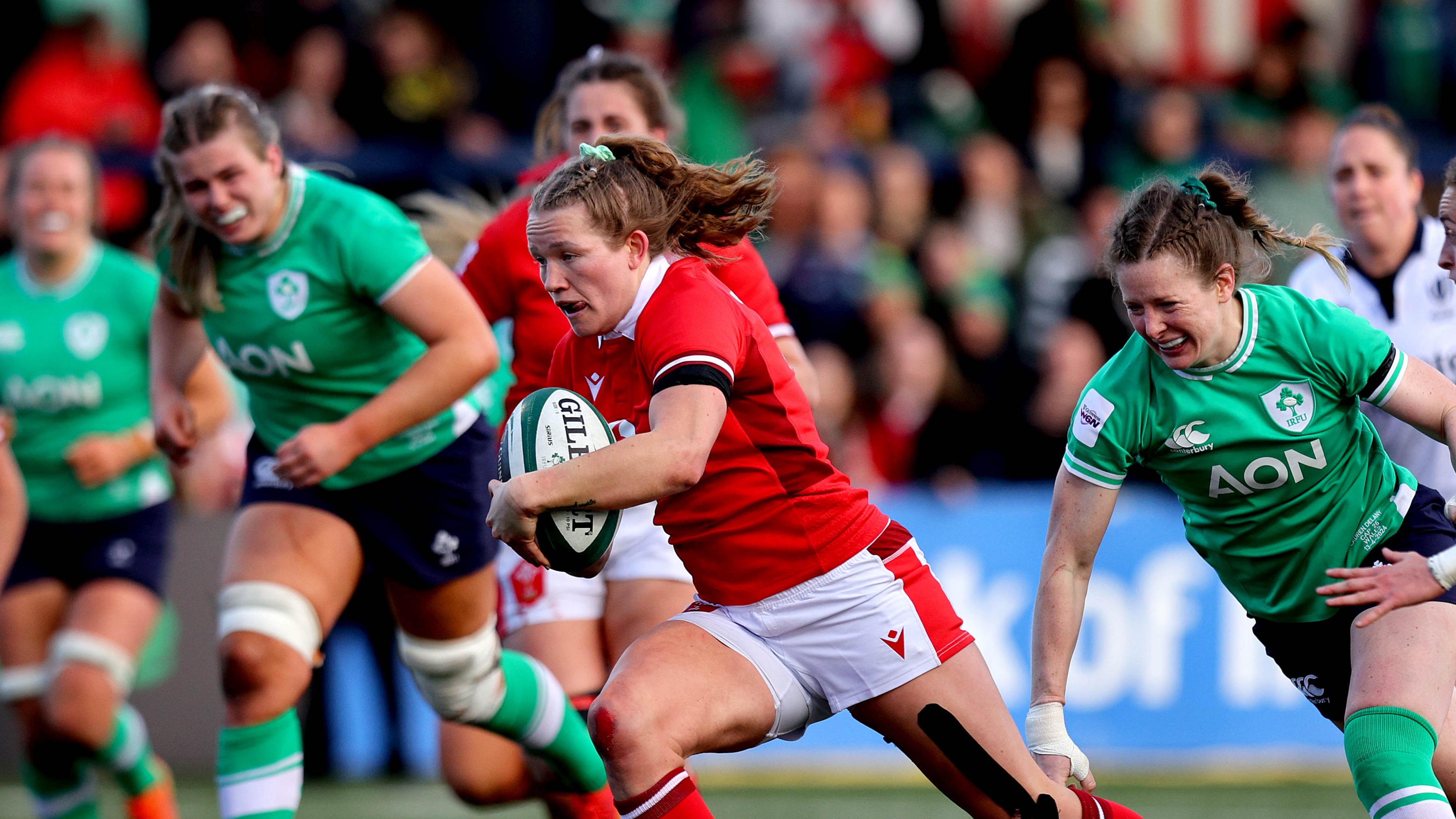 Carys Cox of Wales makes a break during the 2024 Guinness Women's Six Nations match against Ireland in Musgrave Park, Cork.
