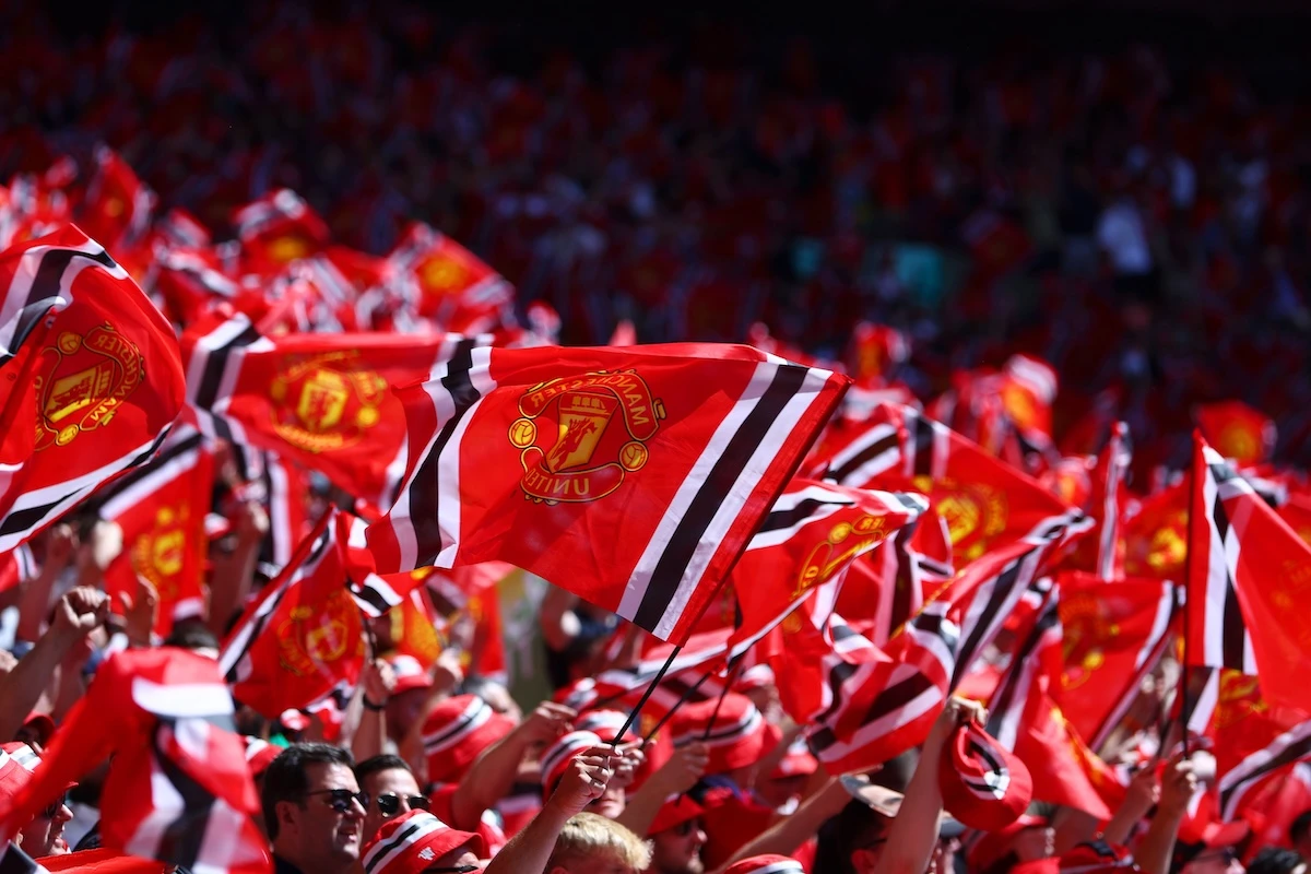 Fans waving Manchester United flags at Wembley