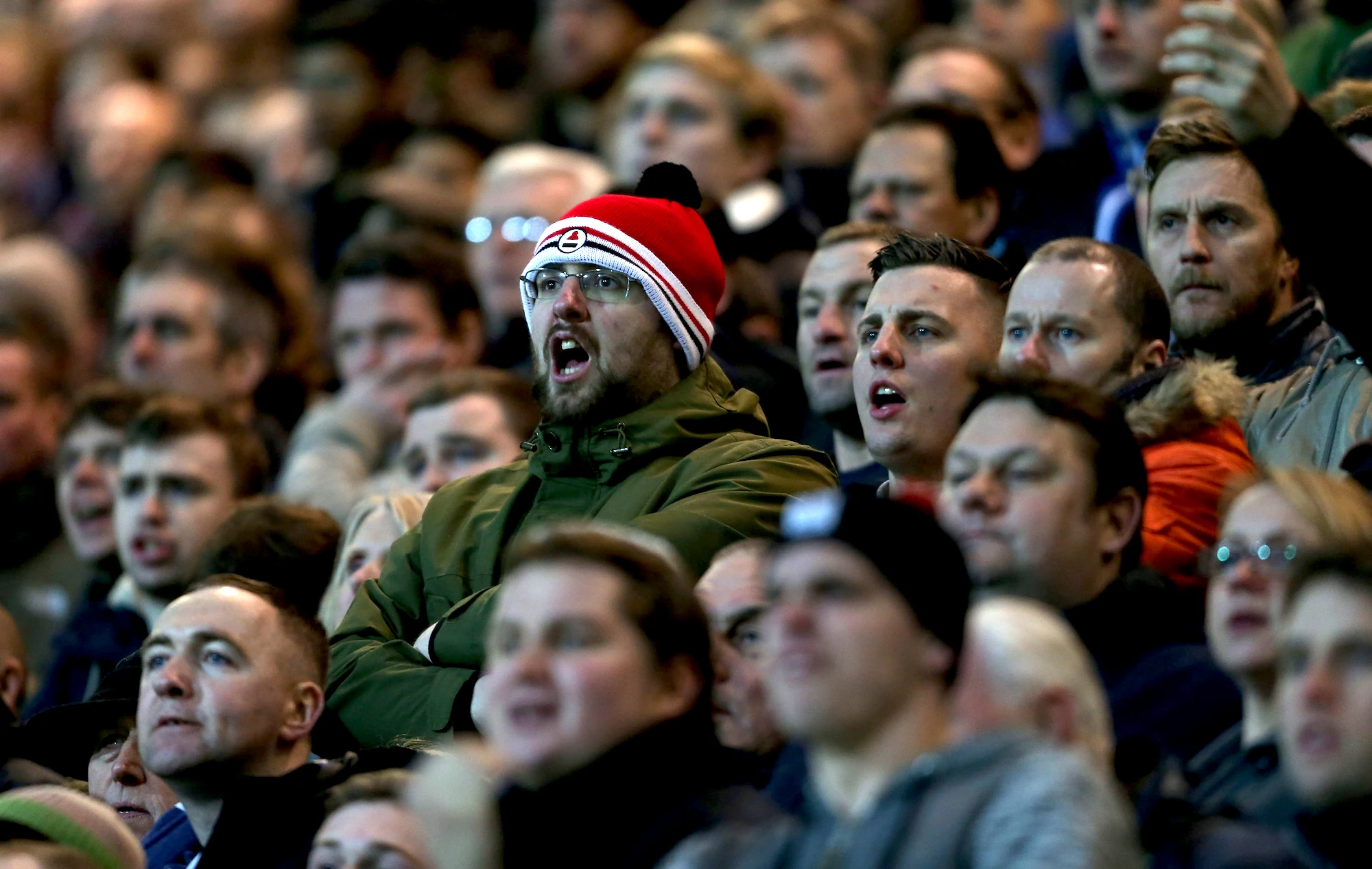 Fans singing at Old Trafford