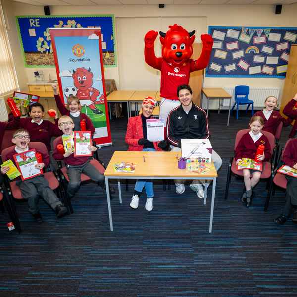 Senne Lammens celebrates World Book Day with Manchester United Foundation
