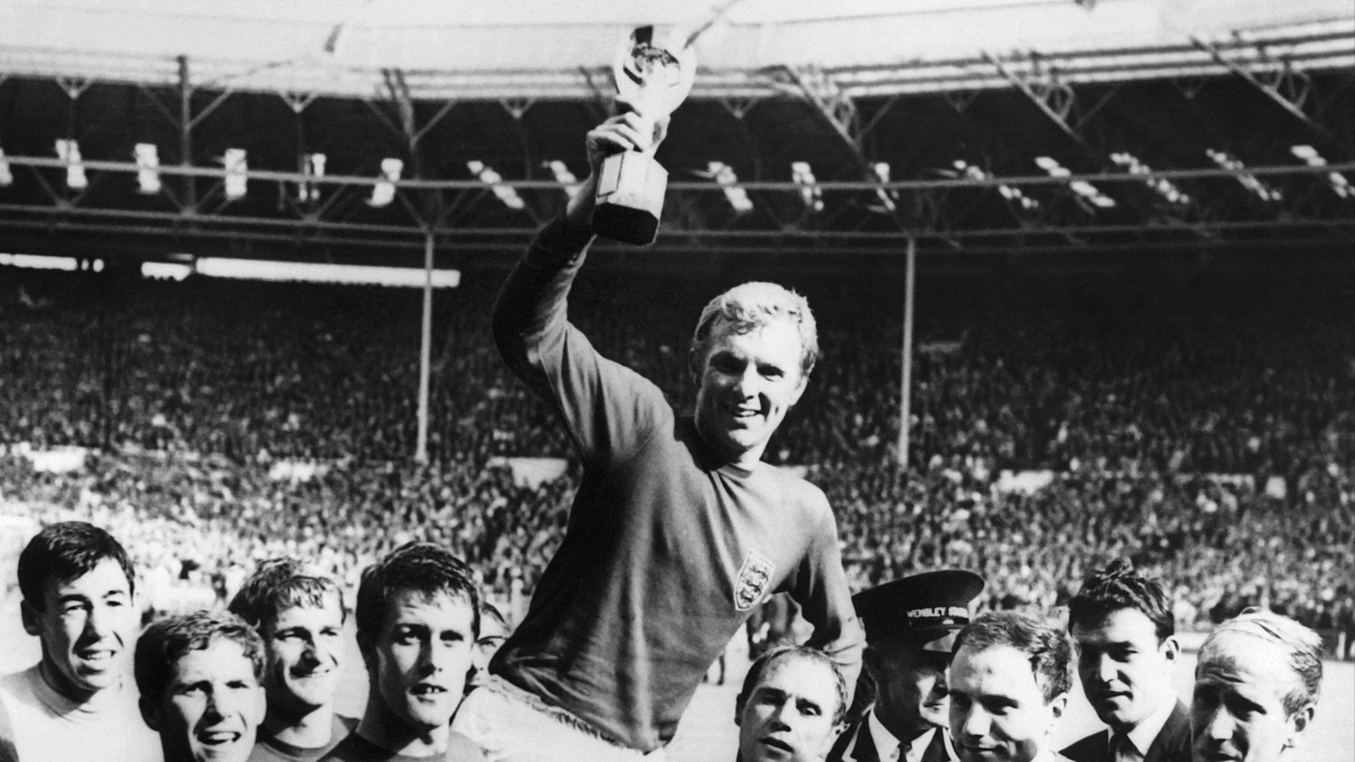 Bobby Moore holds the World Cup aloft