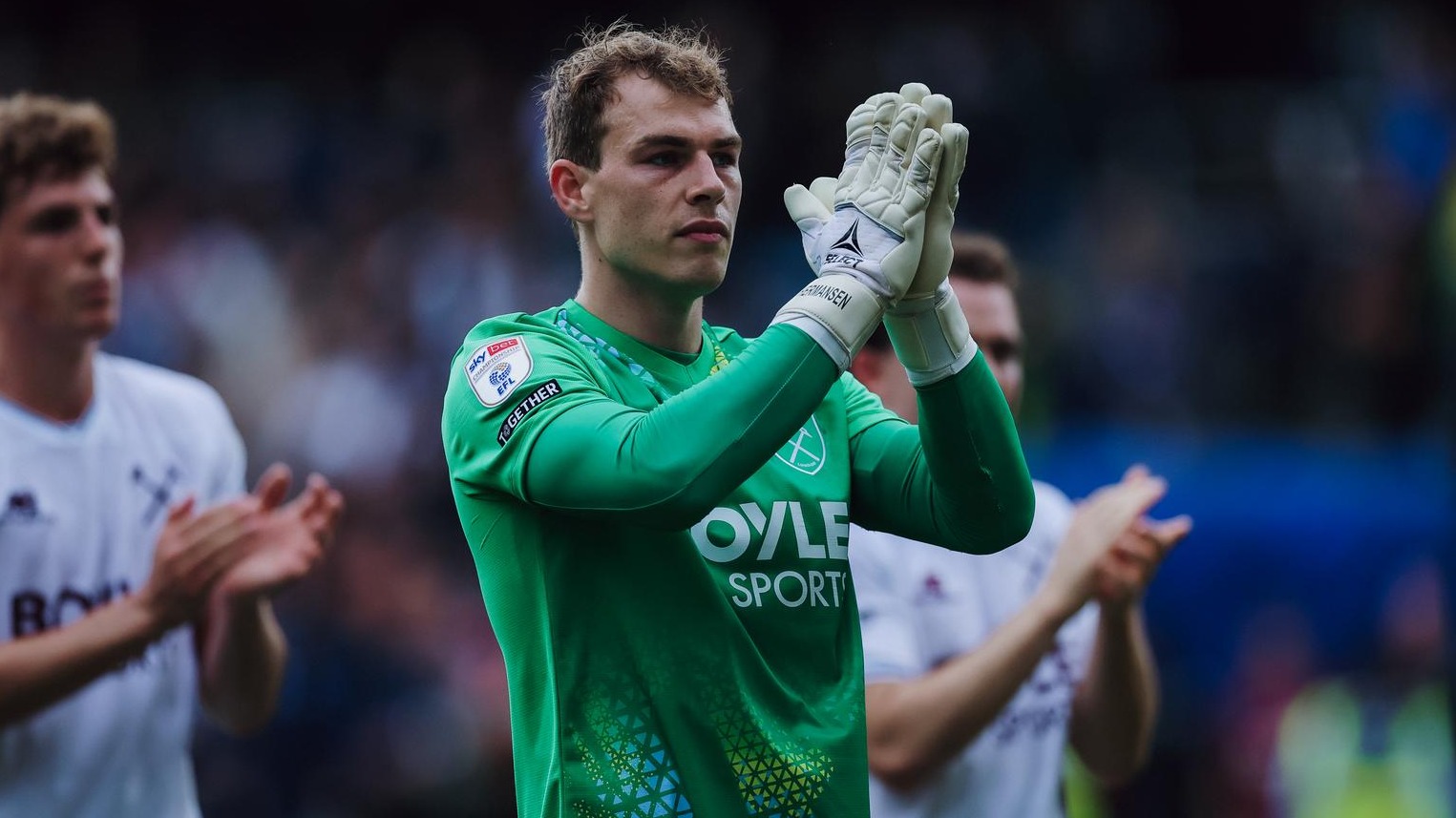 Hermansen applauds fans at Millwall